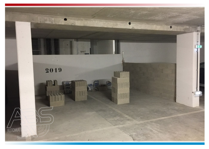 Réalisation des cloisons de séparation et Installation de boxes en sous-sol